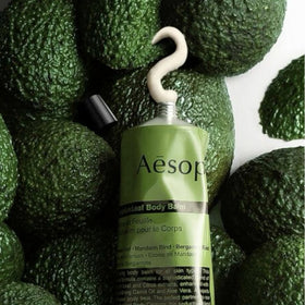 Green citrus aroma note of Aesop Geranium Leaf Body Balm.