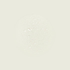 Spraying the Aesop hydrosol mist for quick facial hydration during a busy day.