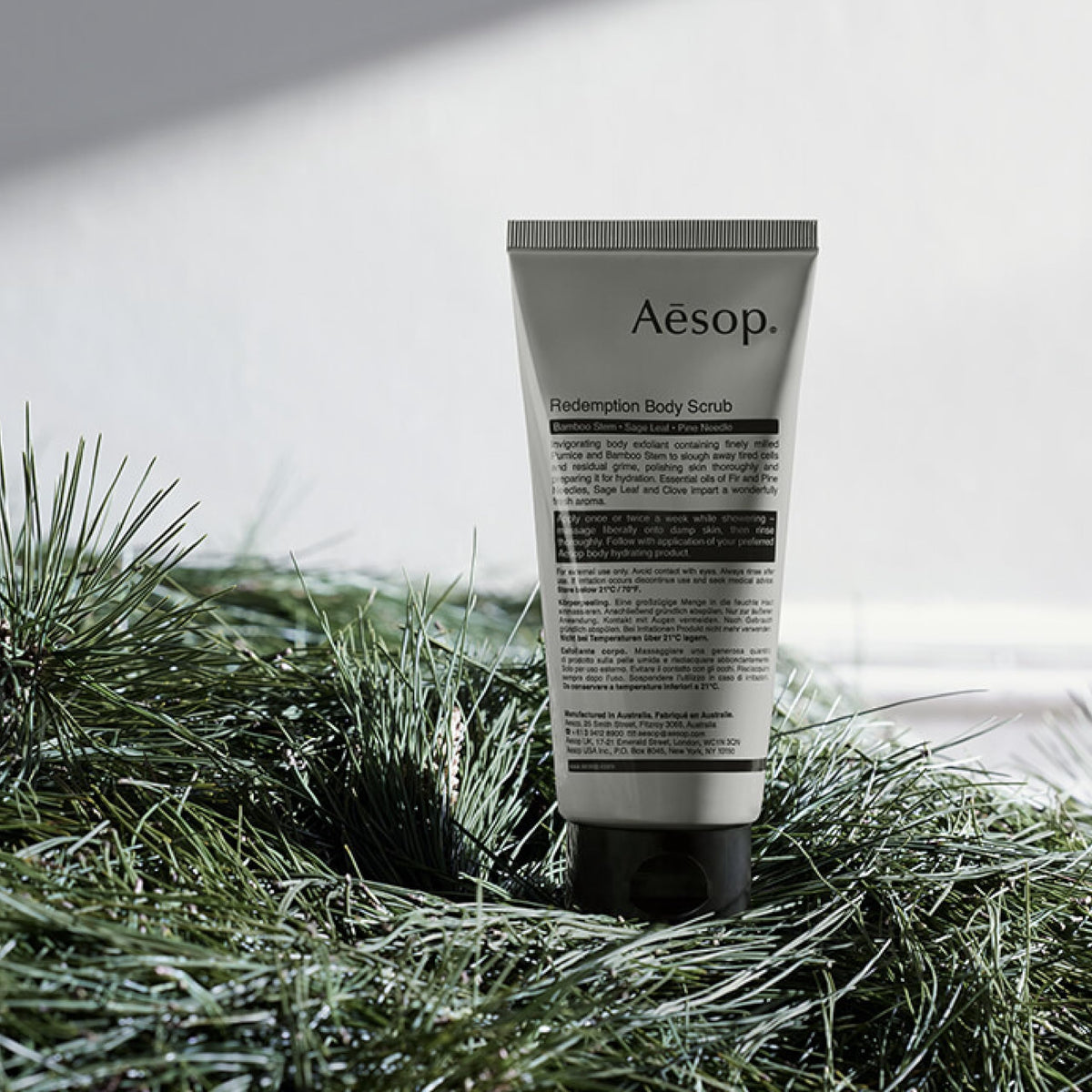 Aesop Redemption Body Scrub pine needle detail hints at alpine fresh aroma.