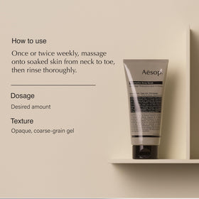 Aesop Redemption Body Scrub texture close-up shows pumice-bamboo for gentle polish.