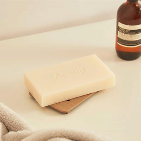 Aesop Refresh Body Cleansing Slab lather demonstrates low-foaming, gentle wash.
