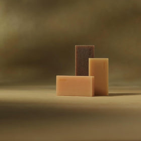 Aesop Refresh Body Cleansing Slab shower scene suggests a refreshing routine.