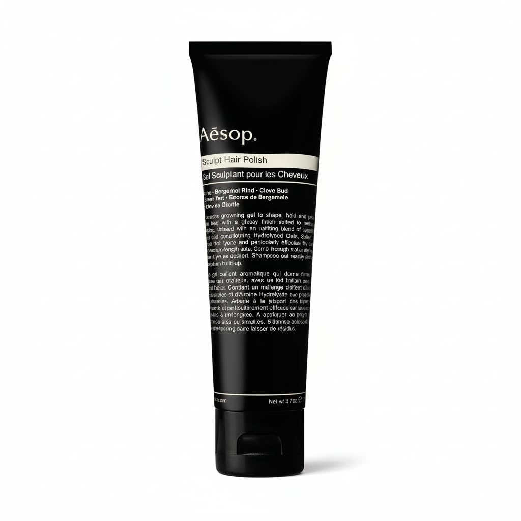 Aesop Sculpt Hair Polish bottle pour for a glossy, structured finish.