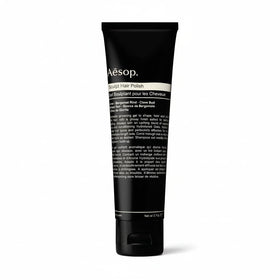 Aesop Sculpt Hair Polish bottle pour for a glossy, structured finish.