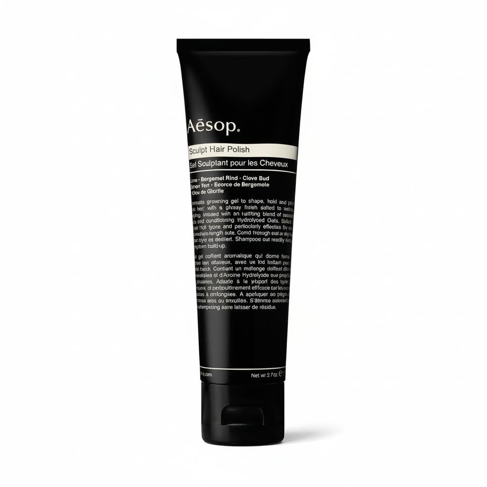 Aesop Sculpt Hair Polish bottle pour for a glossy, structured finish.