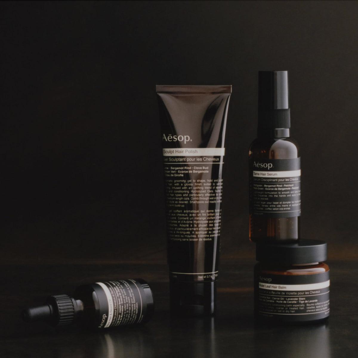 Aesop Sculpt Hair Polish demonstrates a shine boost for a polished style.