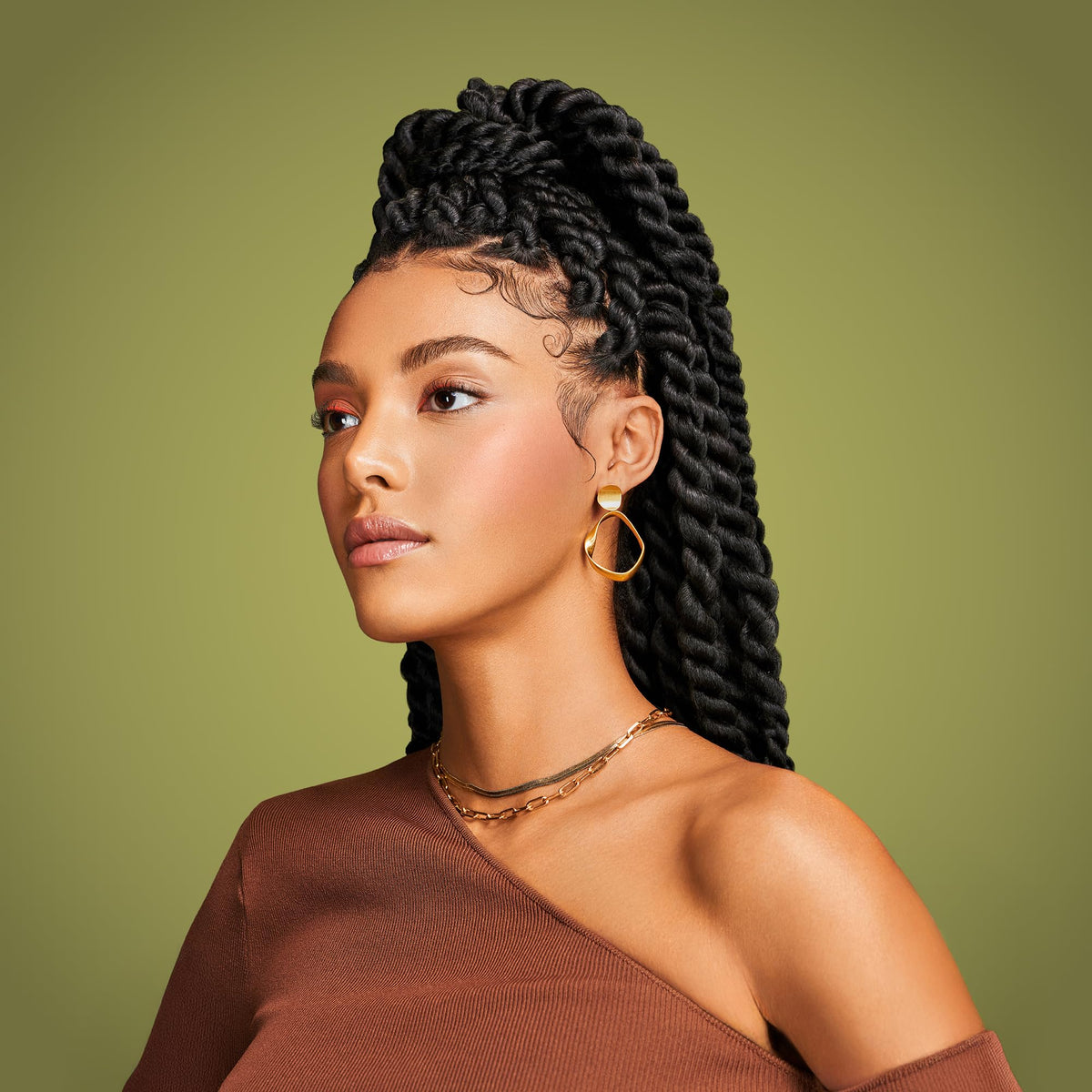 Silky detangled curls with Olive Miracle 2-in-1 after shower.