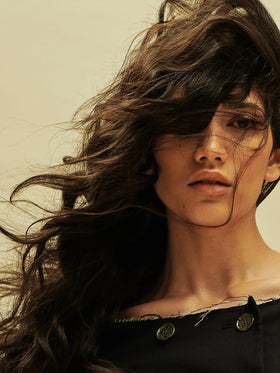 AG Care Tousled Texture spray application for frizz control and shine
