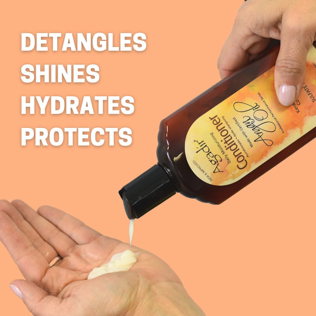 Application shot of Agadir conditioner on damp hair improving detangling and smoothness.