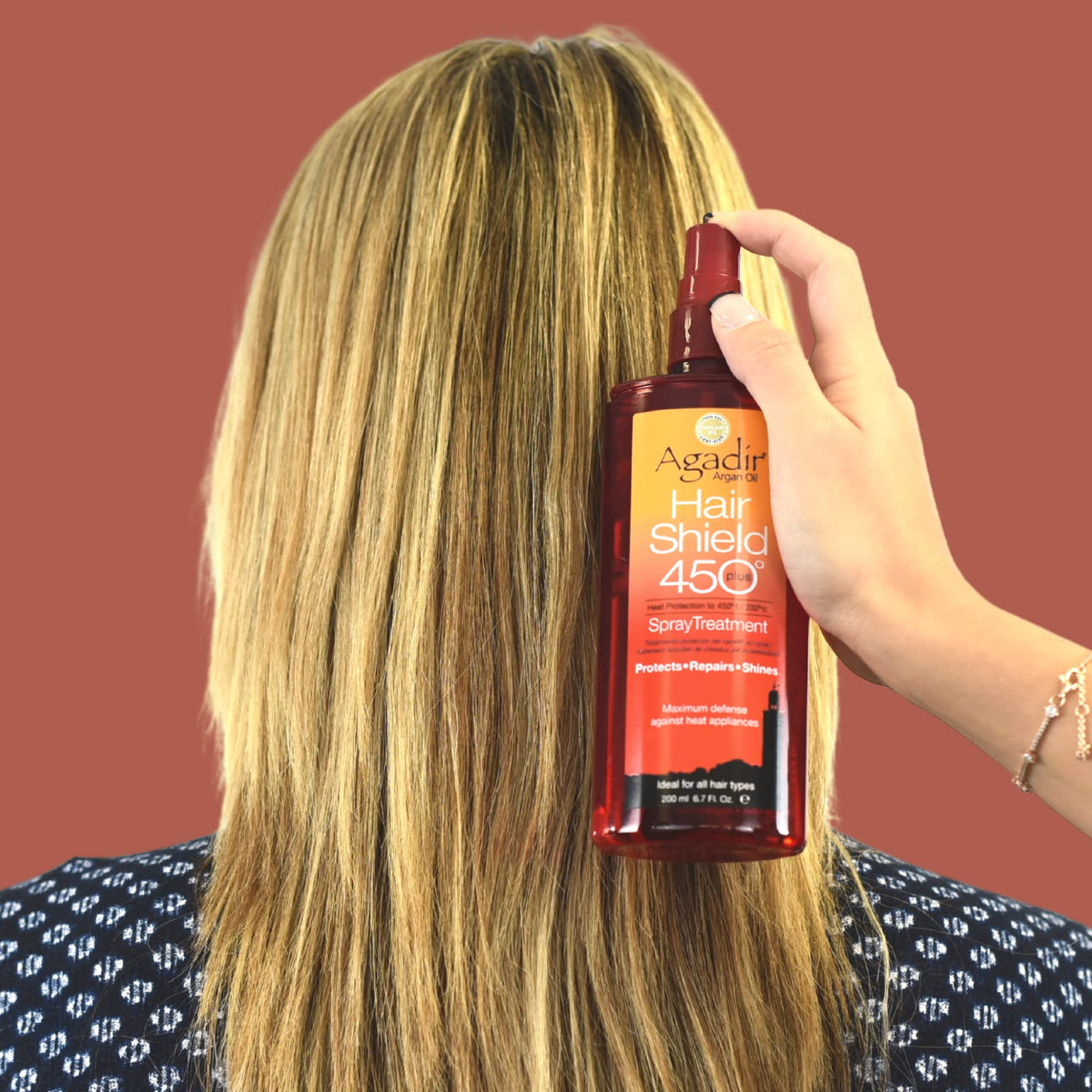 Agadir Hair Shield 450 argan oil-infused formula nourishes while protecting during heat styling.