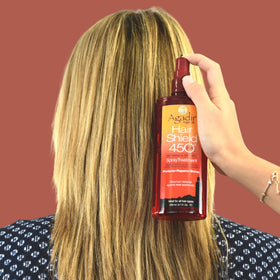 Agadir Hair Shield 450 argan oil-infused formula nourishes while protecting during heat styling.