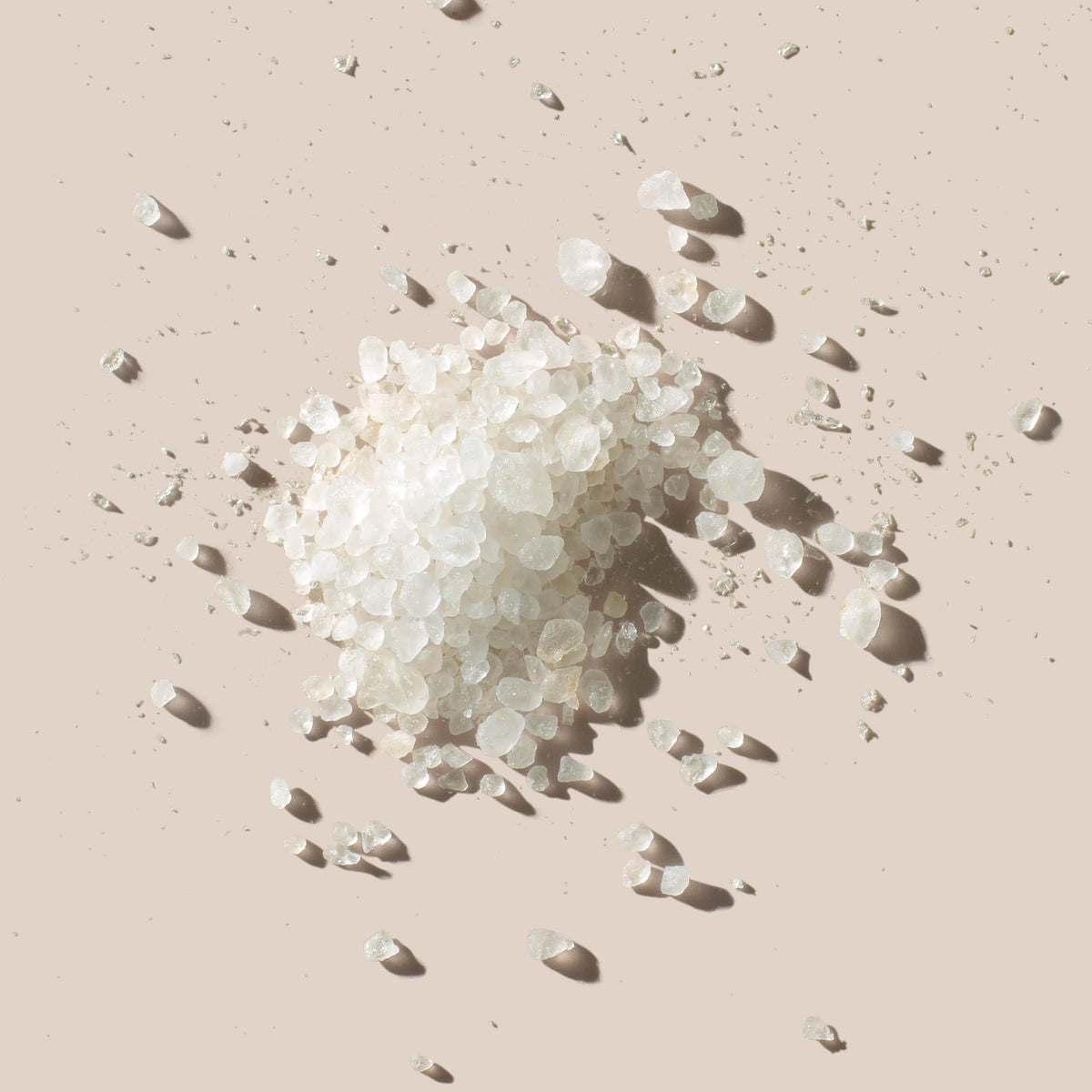 AHAVA Dead Sea Mineral Bath Salt in a bowl for a soothing home spa ritual.