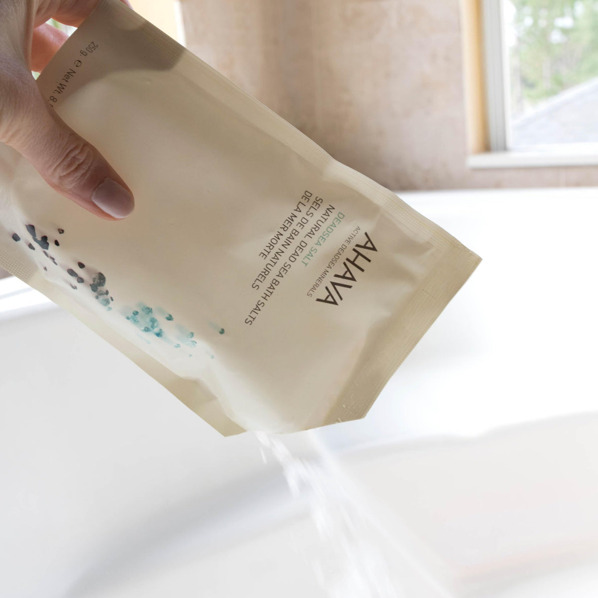 AHAVA Dead Sea Mineral Bath Salt packaging highlights purity and the single-ingredient formula.