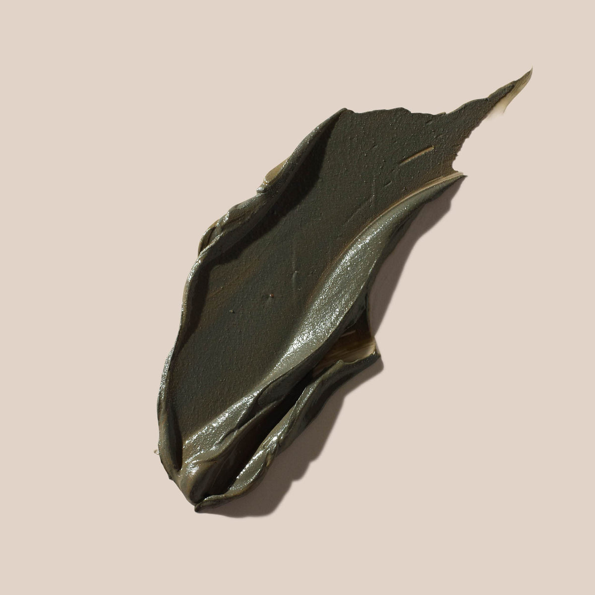 AHAVA Dead Sea Mud jar texture shows creamy mud