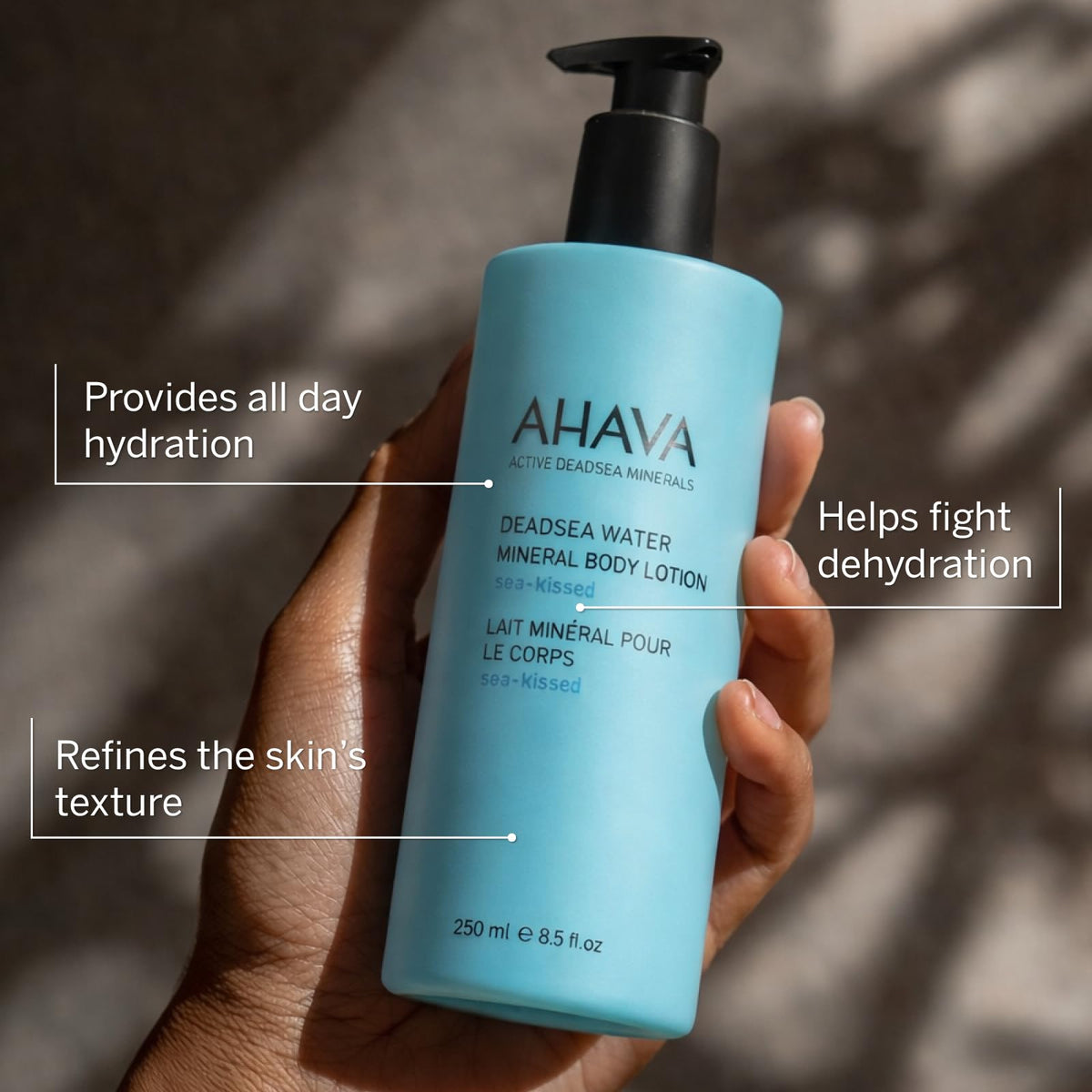 AHAVA Sea-Kissed lotion pump demonstrates easy post-shower application