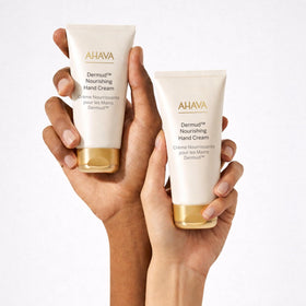 AHAVA Dermud Nourishing Hand Cream ingredients scene featuring Dermud Mud Complex and minerals