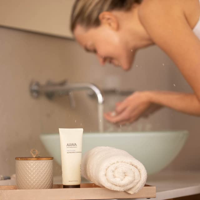 AHAVA gel texture foams on hand, smooth cleansing experience.