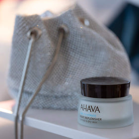 AHAVA Time To Hydrate Night Replenisher packaging close-up highlighting Osmoter minerals.