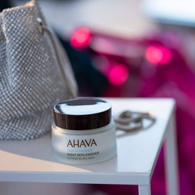 AHAVA Time To Hydrate Night Replenisher texture swirl shows velvety cream for dry skin.