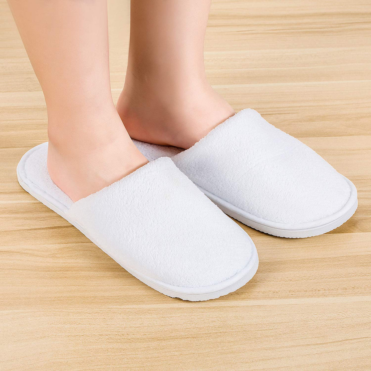 AhfuLife disposable closed-toe slippers ideal for hotels and travel.