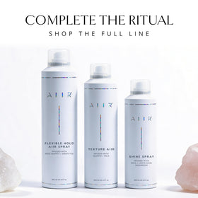 AIIR Shine Spray infused with Crystal Quartz for calm styling vibes.