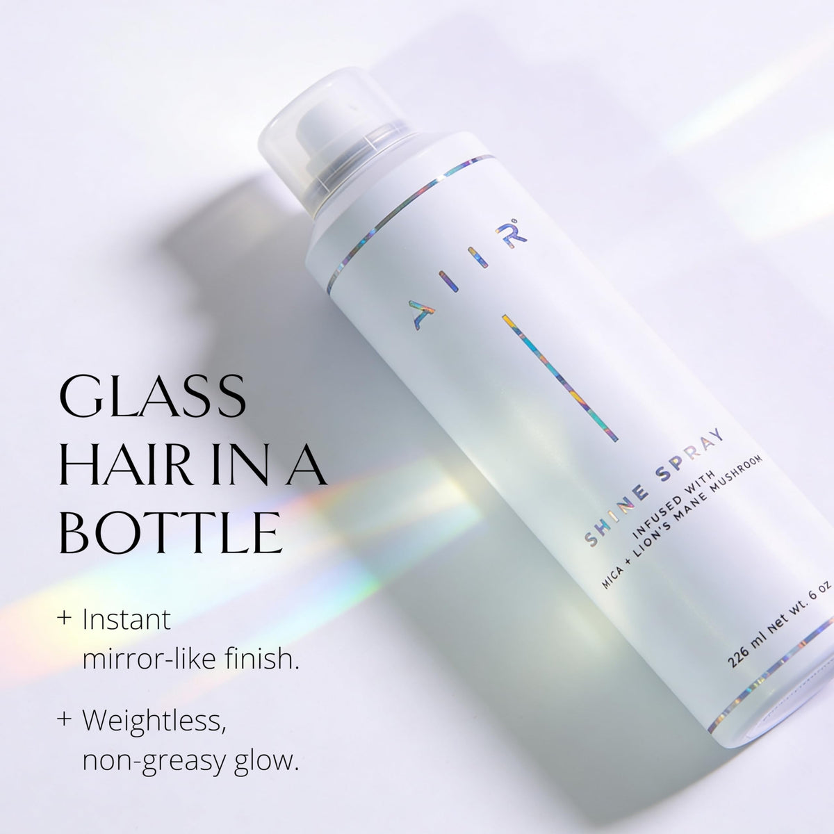 AIIR Shine Spray gloss finish on hair to enhance color and shine.