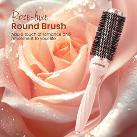 Aimike Rose Luxe Round Brush with retractable pick and four clips for sectioning.