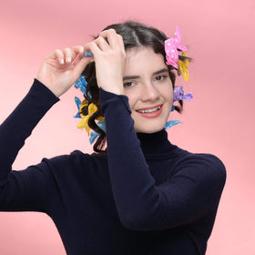 Aimin Hair travel-friendly foam rollers in light color for on-the-go styling