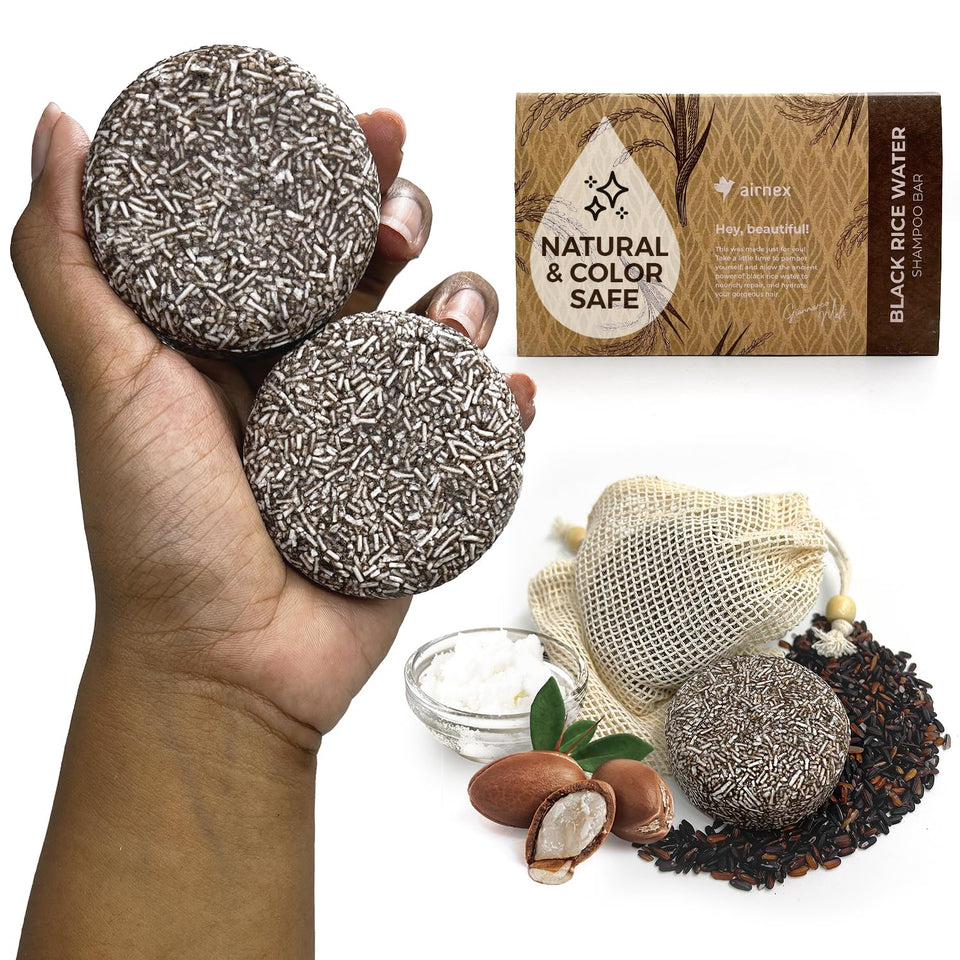 AirNex Black Rice Water Shampoo Bar set with two bars and cotton bags for travel-friendly care.