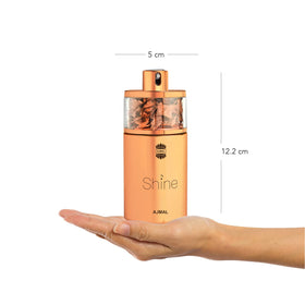 Ajmal Shine EDP cap close-up showing premium detailing.