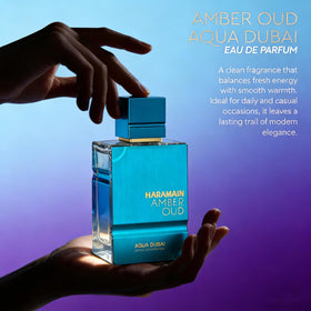 Al Haramain Amber Oud Aqua Dubai packaging close-up suggests gifting-ready luxury.