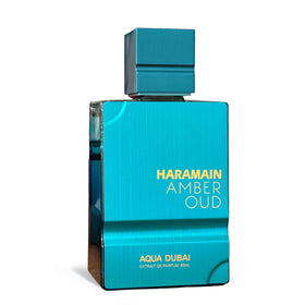 Al Haramain Amber Oud Aqua Dubai on vanity demonstrates all-day wear potential.