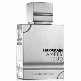 Al Haramain Amber Oud Carbon Edition bottle close-up with premium woody-aromatic notes for daily wear.