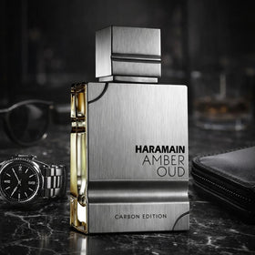 Al Haramain Amber Oud Carbon Edition top notes spray capturing lavender and bergamot opening.