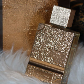 Amber tones glow under light, signaling warm, sophisticated fragrance cues.