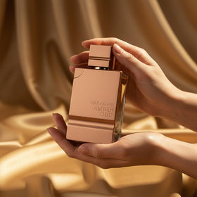 Al Haramain Amber Oud Gold Edition bottle close-up reveals color and texture.