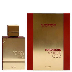 Al Haramain Amber Oud Rouge bottle, evoking warm amber tones for evening wear.