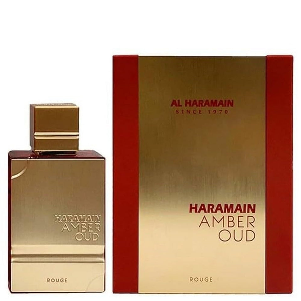 Al Haramain Amber Oud Rouge bottle, evoking warm amber tones for evening wear.