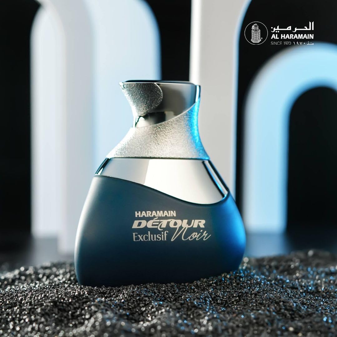 Side engraving on Detour Noir Exclusif bottle highlights craftsmanship.