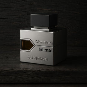 Woody-note accents on the Al Haramain L'Aventure Intense bottle surface