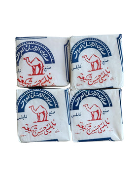 Al-Jamal Palestinian olive oil soap bar close-up highlights pure ingredients for all skin types