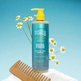 Alaffia Beautiful Curls bottle pouring into hand suggests simple daily use