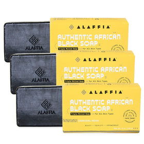 Alaffia charcoal-reishi bar closeup highlighting purifying cleansing.