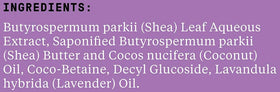Alaffia Lavender shampoo label close-up highlights Fair Trade ingredients and clean formula.