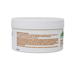 Alba Botanica Kukui Nut Body Cream being massaged into skin for smoothness.