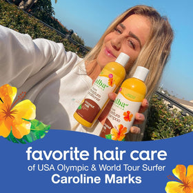 Shelf-view of Alba Botanica More Moisture Coconut Milk conditioner for hydrated, manageable hair.