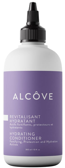 Alcôve hydrating conditioner bottle highlighting argan oil for silky, frizz-free hair.