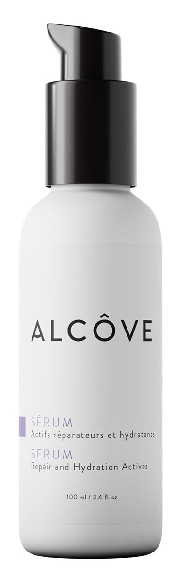 Alcôve Serum bottle with pump delivering smooth, frizz-free results for dry hair.