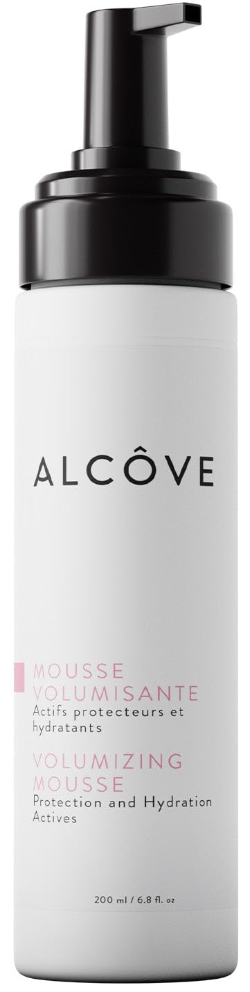 Alcôve Volumizing Mousse bottle pour demonstrates lightweight hold for fine hair.