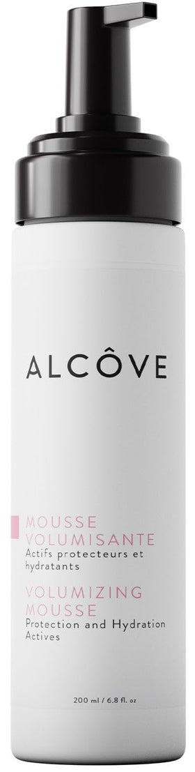 Alcôve Volumizing Mousse bottle pour demonstrates lightweight hold for fine hair.